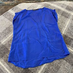 The limited blouse. Size Small. Deep blue.